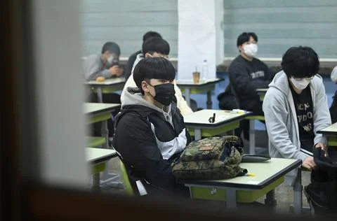 Students take the College Scholastic Aptitude Test, in South Korea, Seoul - 18 N Stock Photos