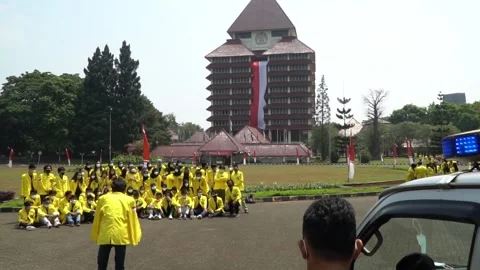 Students take a picture and supervised by the covid-19 task force Stock Footage 159779534