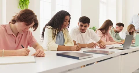 Students taking notes in college classroom during collaborative active learning Stock Footage 345456538