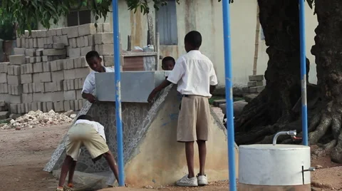STUDENTS TAKING SECURITY COVER OFF OF FAUCETS Stock Footage 60524121