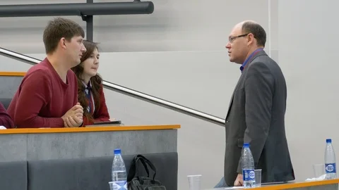 Students talk to each other before the lecture. Stock Footage 104608797