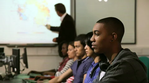 Students with teacher in computer classroom Stock Footage 833427