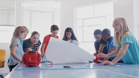 Students With Teachers In After School Computer Coding Class Learning To Program Stock Footage 111932824