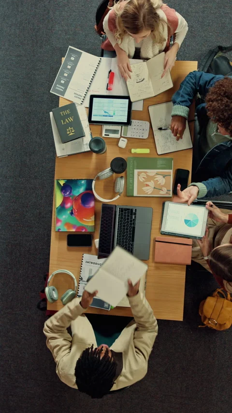 Students, tech or notebook in library with college course, discussion or study Stock Footage 335807188