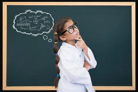Students is thinking about graphics against school board background Stock Photos