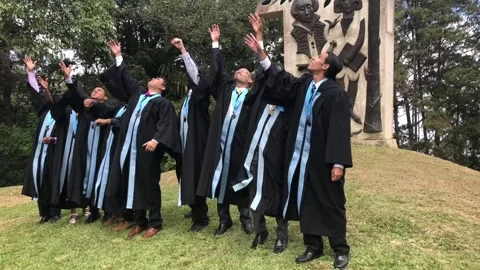 Students throwing graduation hats Stock Footage 158456257