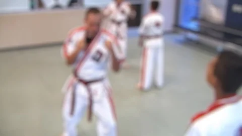 Students Training in Karate Class - Out of Focus Stock Footage 98388031