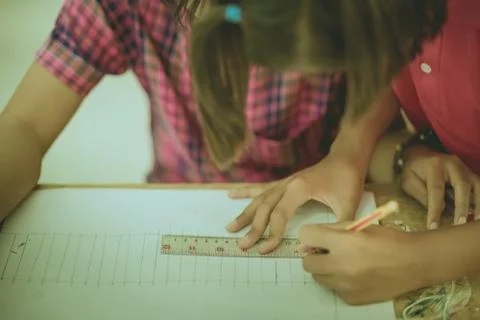 Students try to drawing a basic pattern Thailand with a pencil i Stock Photos