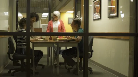 Students with tutor in small office in college. 動画素材 88016304
