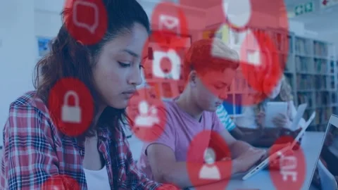 Students typing and tapping devices in library, red icons appearing over scene Stock Footage 332296143