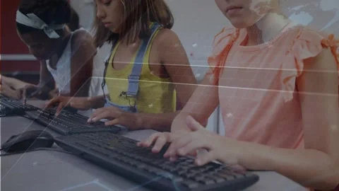 Students typing in tech lab, causing camera panning while grid overlay marking Stock Footage 334038668