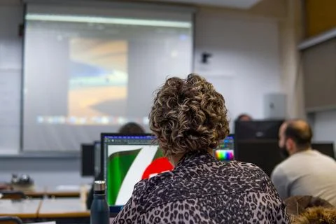 Students University Class Working on '7UP' logo with Computers Seen from Behind Stock Photos