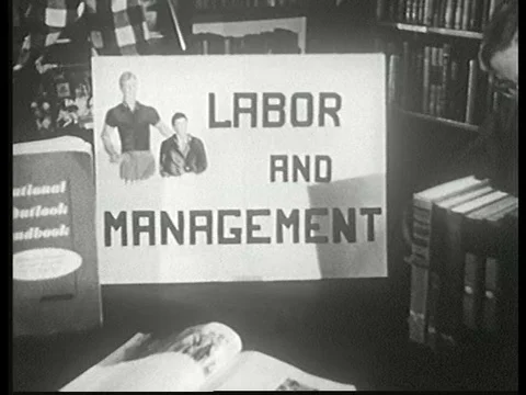 Students use different methods to research labor and management issues. Stock Footage 75289988