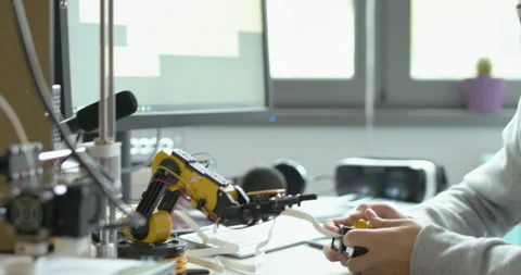 Students using a 3D printer in the lab Stock Footage 168337820