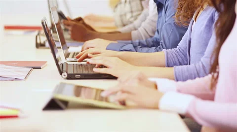 Students using computer in classroom Stock Footage 32818312