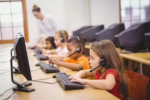 Students using computers in the classroom Stock Photos