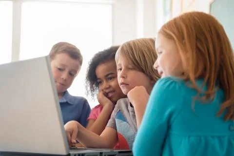 Students using laptop in classroom 写真素材