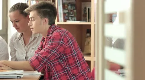 Students using Laptop Computer in the Reading Room. Dolly shot. Video stock 11895333