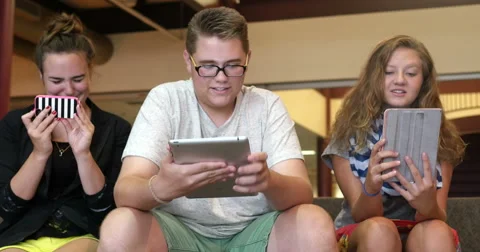 Students using newer technology in a school. Ultra HD 4K Stock Footage 45652931