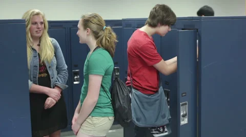 Students visiting locker in school Stock Footage 30482438