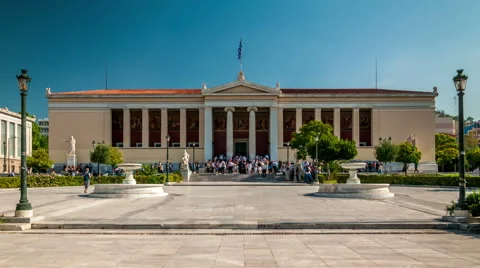 Students wait for Graduation ceremony in front of University of Athens building Stock Footage 56573459