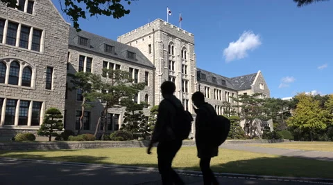 Students walk to class on campus of prestigious Korea University in Seoul Stock Footage 60794729