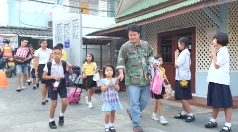 Students walk to school Stock Footage 47258948