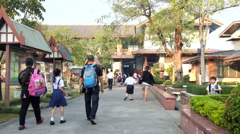 Students walk to school Stock Footage 47259721