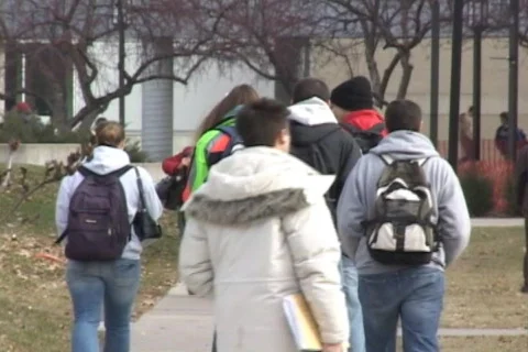 Students walking on campus Stock Footage 548975