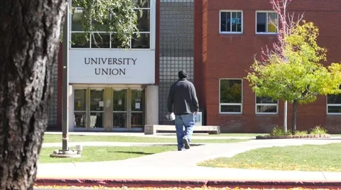 Students walking on campus Stock Footage 55848095