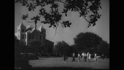 Students walking on a campus in Prairie View College - 1943 Stock Footage 106379002