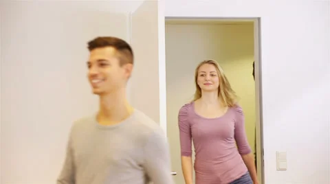 Students walking in classroom Stock Footage 33468391