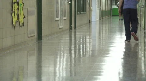 Students walking down hall by lockers (10 of 16) Stock Footage 50415868