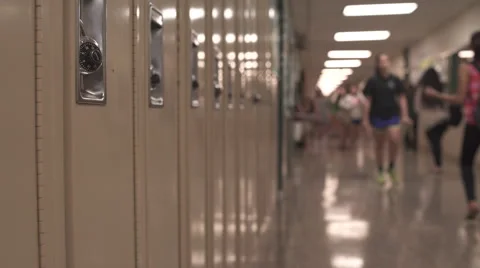 Students walking down hall by lockers (6 of 16) Stock-Footage 50416637