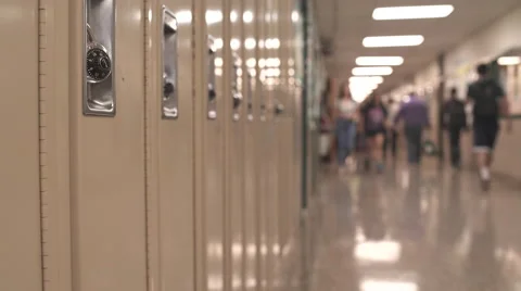Students walking down hall by lockers (2 of 16) Video stock 50417157