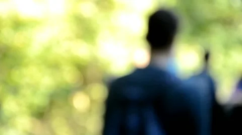 Students walking on forest road Stock Footage 43255922