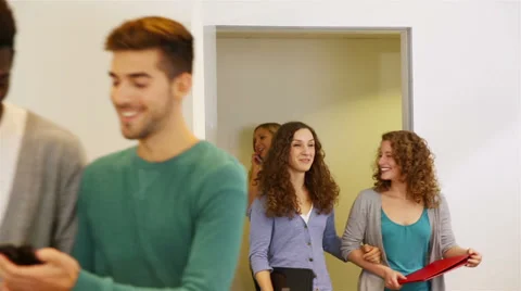 Students walking through door Stock Footage 32818856