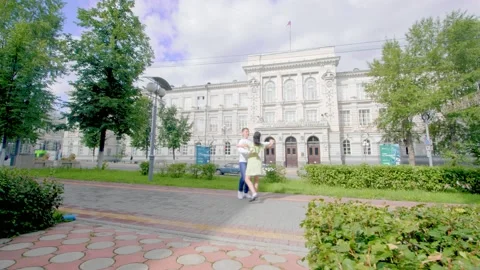 Students waltz dancing by the road Stock Footage 169793224