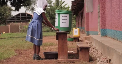 The students wash their hands during the coronavirus emergency.  Stock Footage 146489855