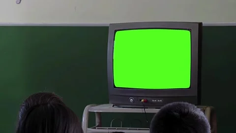 Students Watching Old TV with Green Screen in Classroom - 4K Stock Footage 340045352