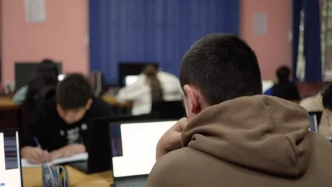Students work on the computer during a computer science lesson Stock Footage 291988324