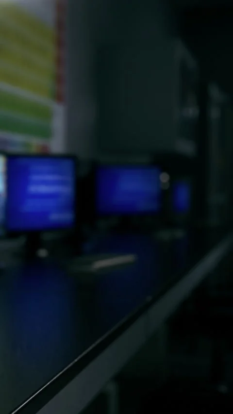 Students work on computers in a classroom during the day Stock Footage 338387047