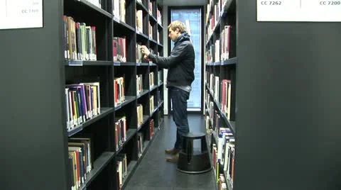 Students work in Jacob and Wilhelm Grimm-Center in Berlin Vídeo Stock 11408722