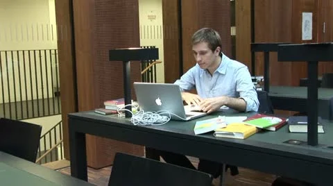 Students work in Jacob and Wilhelm Grimm-Center in Berlin Vídeo Stock 11492991