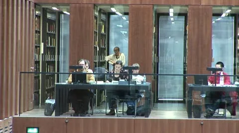 Students work in Jacob and Wilhelm Grimm-Center in Berlin Vídeo Stock 11493271