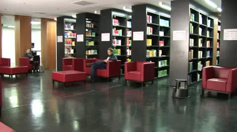 Students work in Jacob and Wilhelm Grimm-Center in Berlin Vídeo Stock 11493378