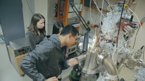 Students work on a science project in one of the modern laboratory Stock Footage 100523466