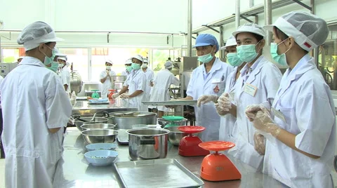 Students Working In A Canning Factory 스톡 동영상 1068835