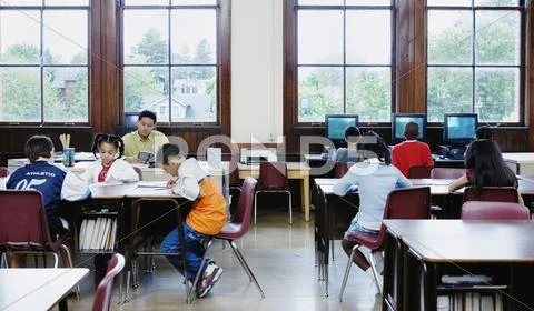 Students working in classroom Stock Photos