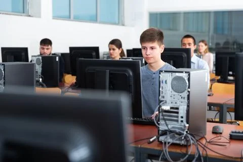 Students working on computers in classroom 스톡 사진
